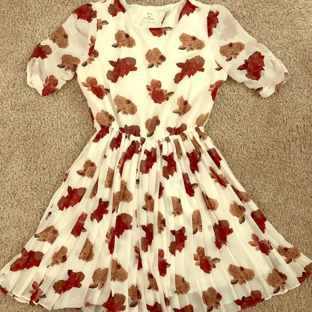 Floral dress with partly open back.